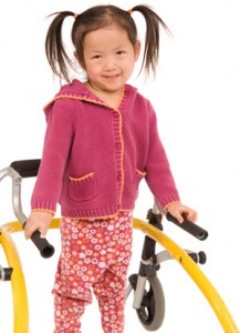 child with walking frame